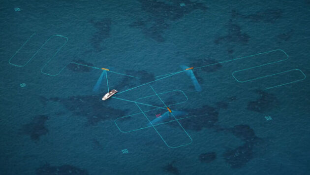 Aerial view of a small white sailboat with blue wings on turquoise ocean, surrounded by light blue outline shapes in the water.